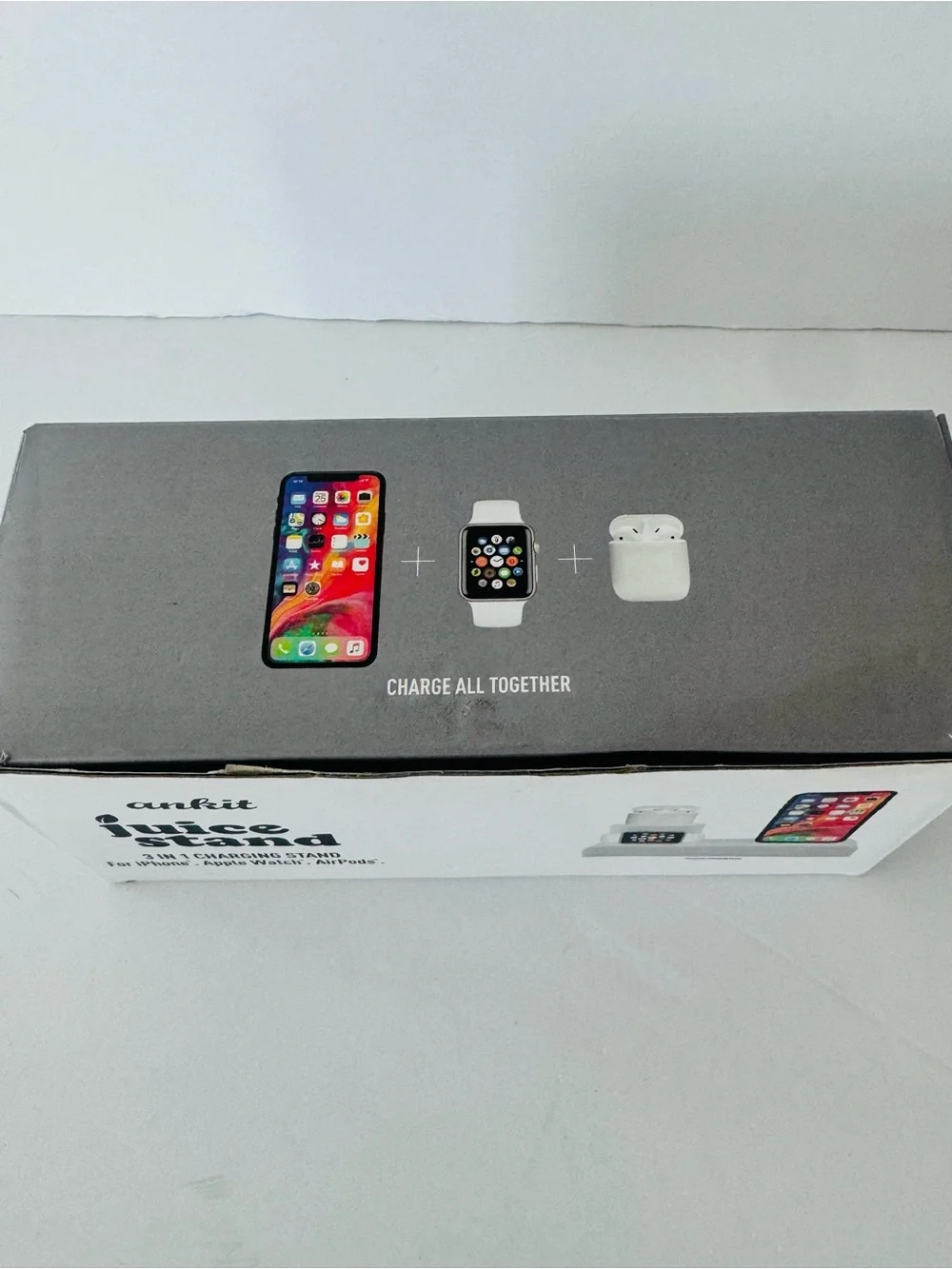 Brand new Ankit Juice Stand 3 in 1 charging dock silicone stand in white.